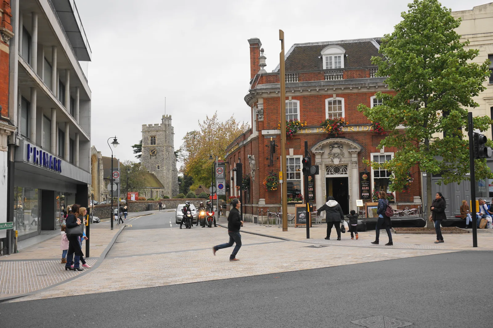 The Partridge on Bromley High Street, with the tower of the parish church of St Peter and St Paul behind