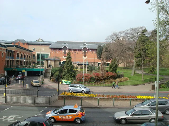 The Glades shopping centre beside Queen's Gardens, Bromley, in an earlier year. Kaizen trades from the centre's Queen's Gardens restaurant terrace; this photograph does not show the restaurant.